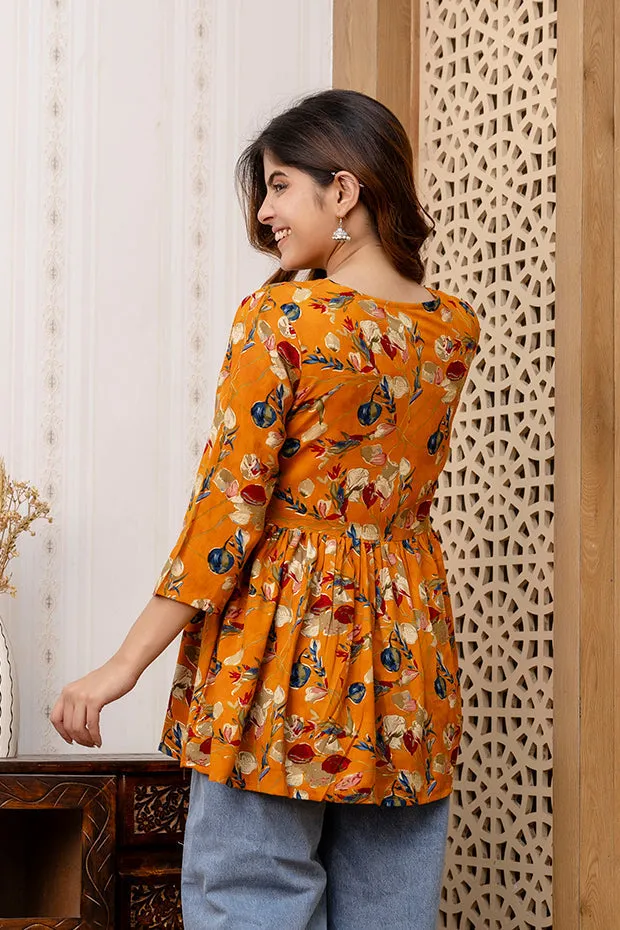 Women Mustard Printed V-Neck Peplum Tunic